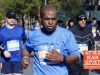Faces of NYC Marathon runners in Harlem