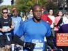 Faces of NYC Marathon runners in Harlem