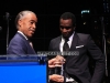Rev. Al Sharpton presenting a Triumph Award to Sean (Diddy) Combs